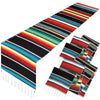 A vibrant Mexican serape table runner featuring colorful stripes and tassels.