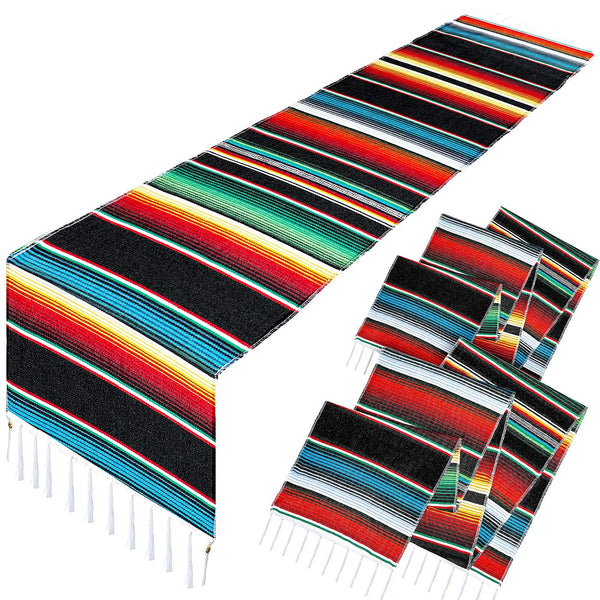 A vibrant Mexican serape table runner featuring colorful stripes and tassels.