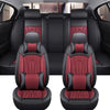 Black and red full coverage PU leather car seat covers shown in a vehicle interior.