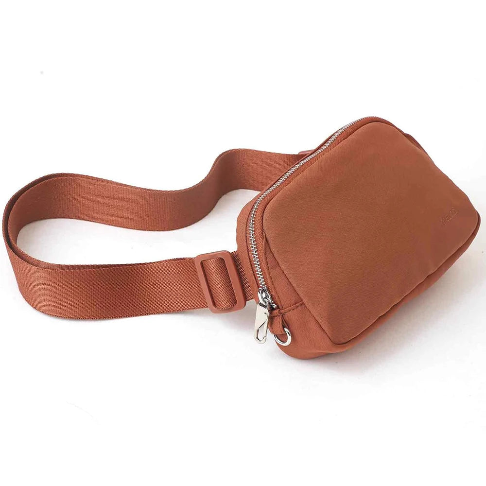 A brown nylon waist pack with a zippered pocket and adjustable strap.