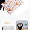 A reusable waterproof wet bag set featuring a colorful floral pattern and a hanging hook.