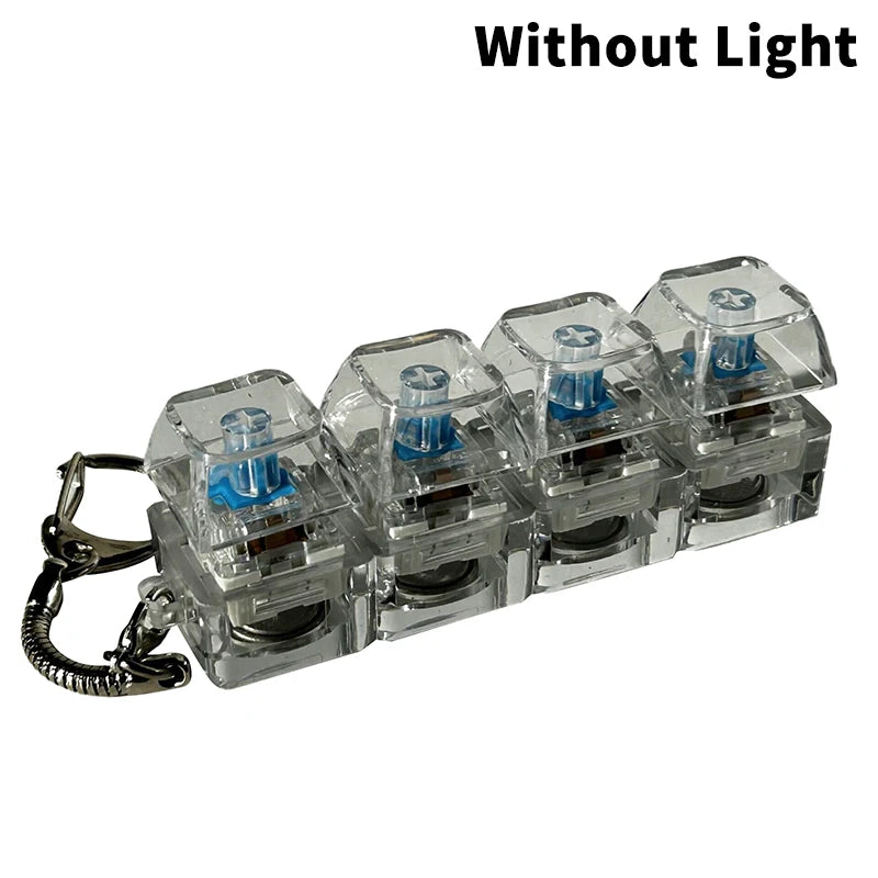 A row of clear acrylic LED mechanical keychain fidget toys with blue keycaps, shown without light.