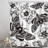 Black and white gothic skull shower curtain featuring detailed moth and floral patterns