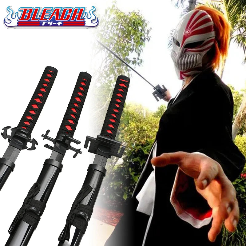 A replica wooden katana sword of Ichigo Kurosaki from Bleach is shown next to a person wearing a mask and black clothing.