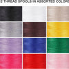 A collection of twelve assorted colored polyester sewing threads in prewound spools.