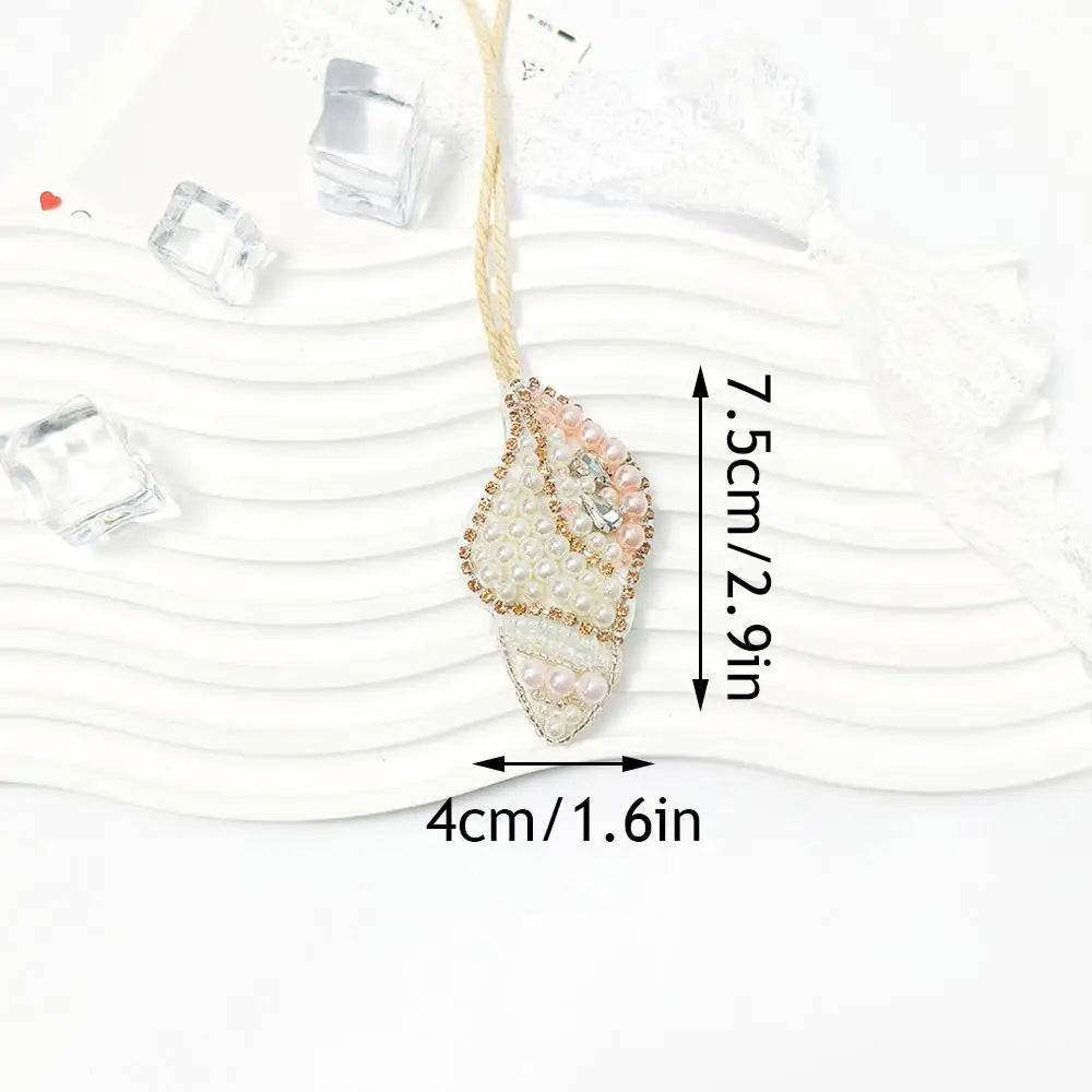 Handcrafted rhinestone bag charms featuring a sequin octopus and turtle pendant keychains