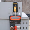 A black holster for a MELOTOUGH drill with an orange grip and metal belt hook attached.