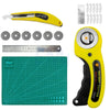 Yellow rotary cutter sewing kit with a cutting mat, ruler, and spare blades.
