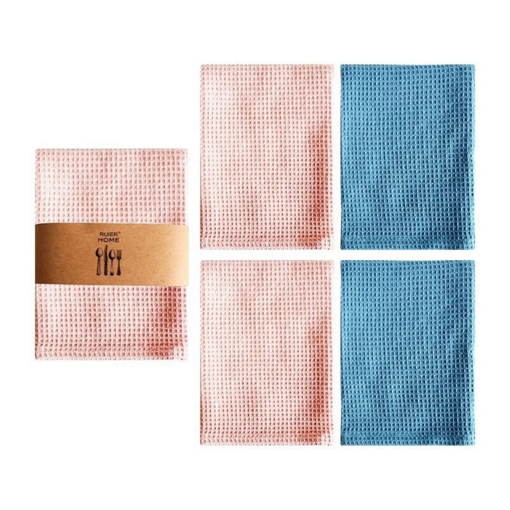 A set of four pink and blue waffle weave towels displayed side by side.