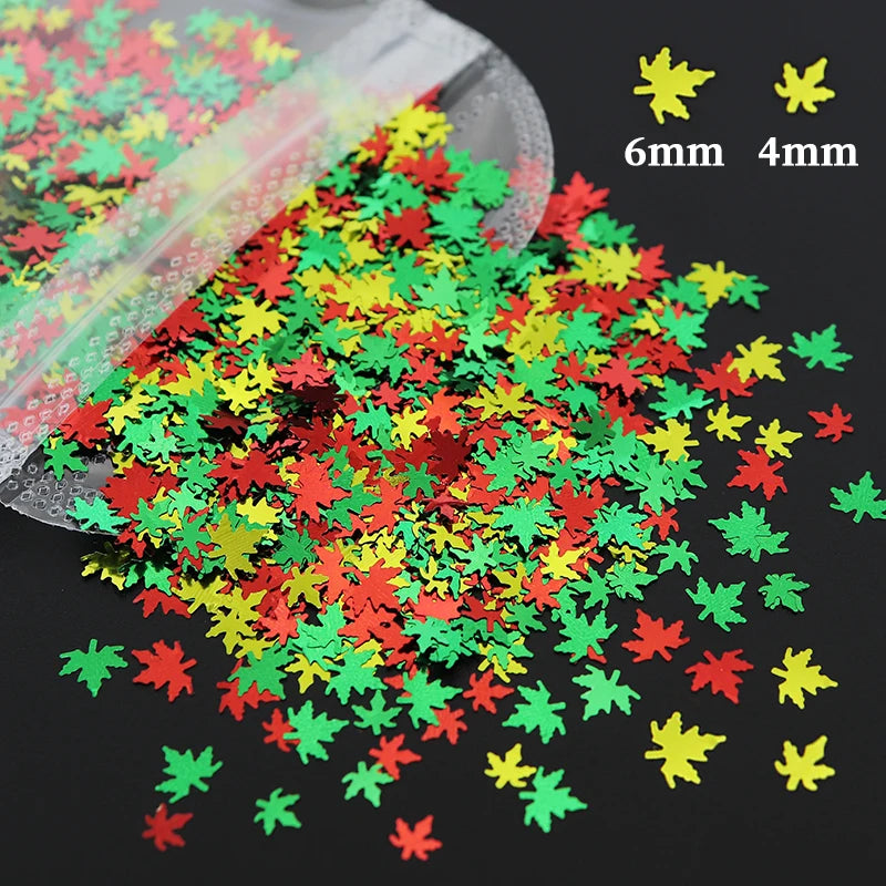 A pile of green, red, and yellow holographic star sequins for resin crafts, with size indicators 6mm and 4mm.