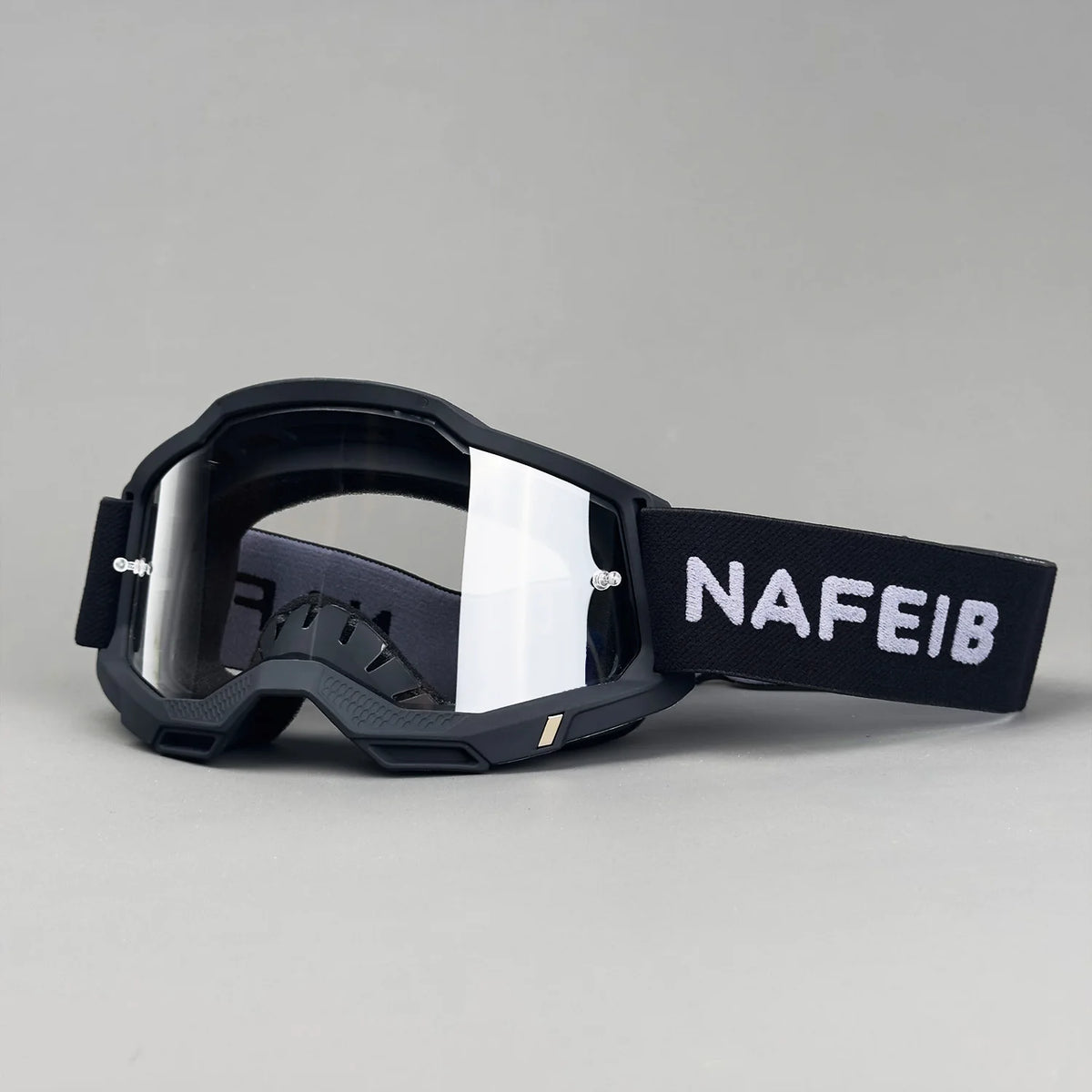 Black professional MX off-road goggles with an HD lens and a black strap featuring the text NAFEIB