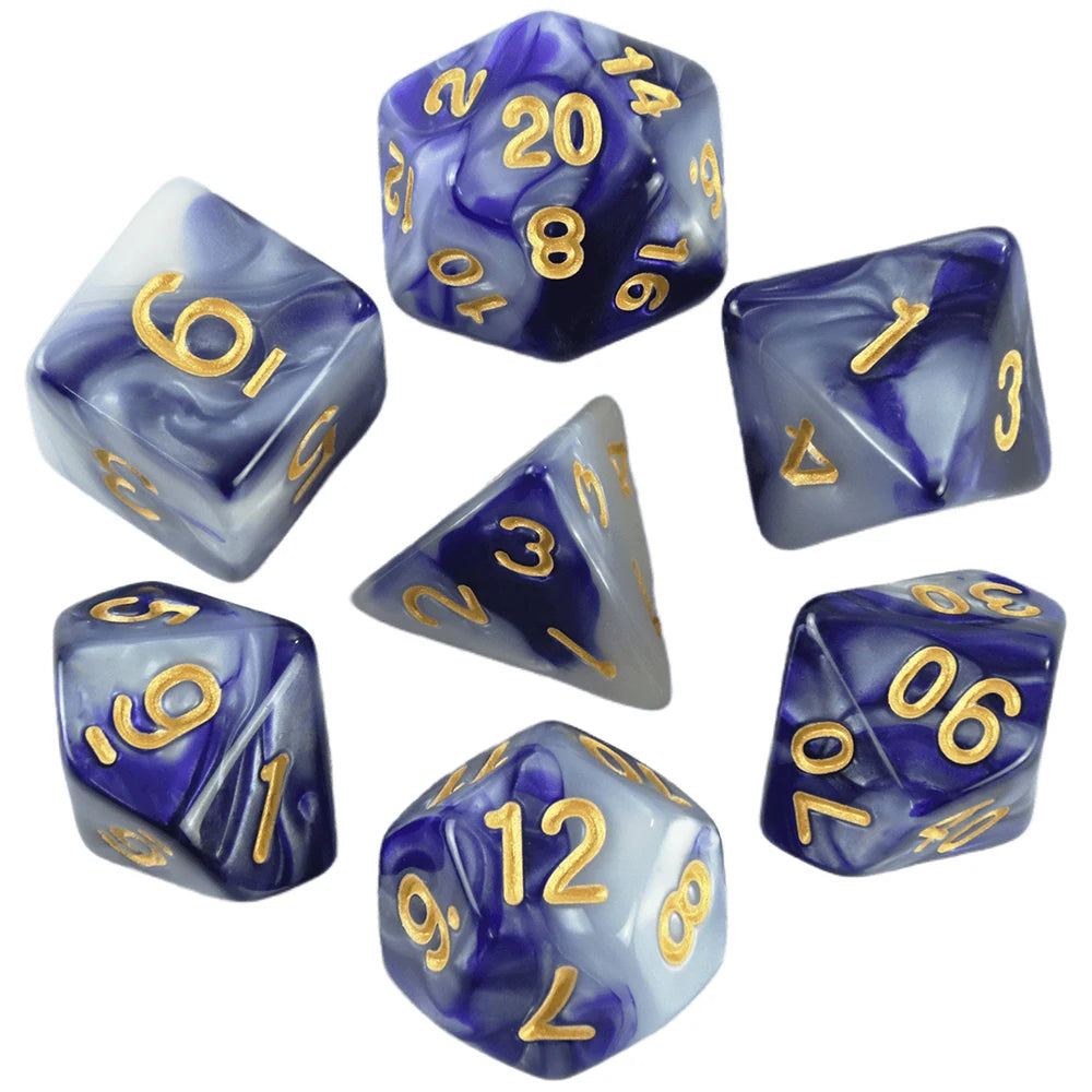 A set of seven polyhedral dice in shades of blue and white, showing various angles and numbers.