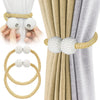 Pearl magnetic curtain tiebacks in beige and gray fabric with gold cord accents shown in use.