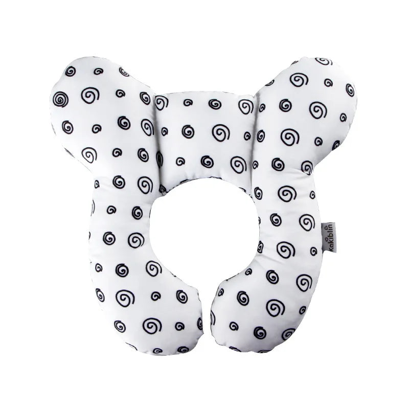 A white baby head and neck support pillow designed for car seats and travel.