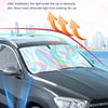 A car sunshade is installed on a vehicle windshield, blocking ultraviolet light and providing glare protection.