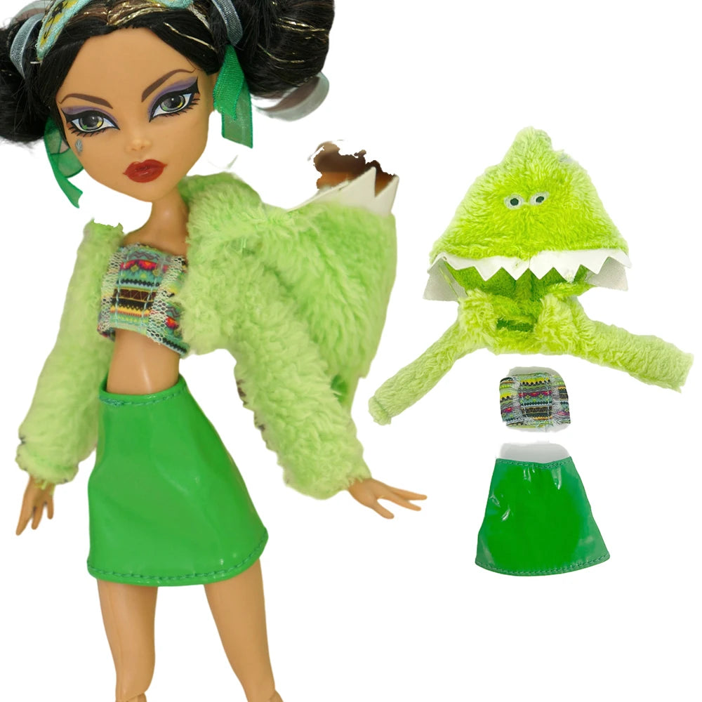 A fashion doll dress outfit featuring a green jacket and skirt, accompanied by a green frog-like accessory.