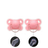 Pink silicone baby pacifier with a flower design and protective cover shown from the top and side.