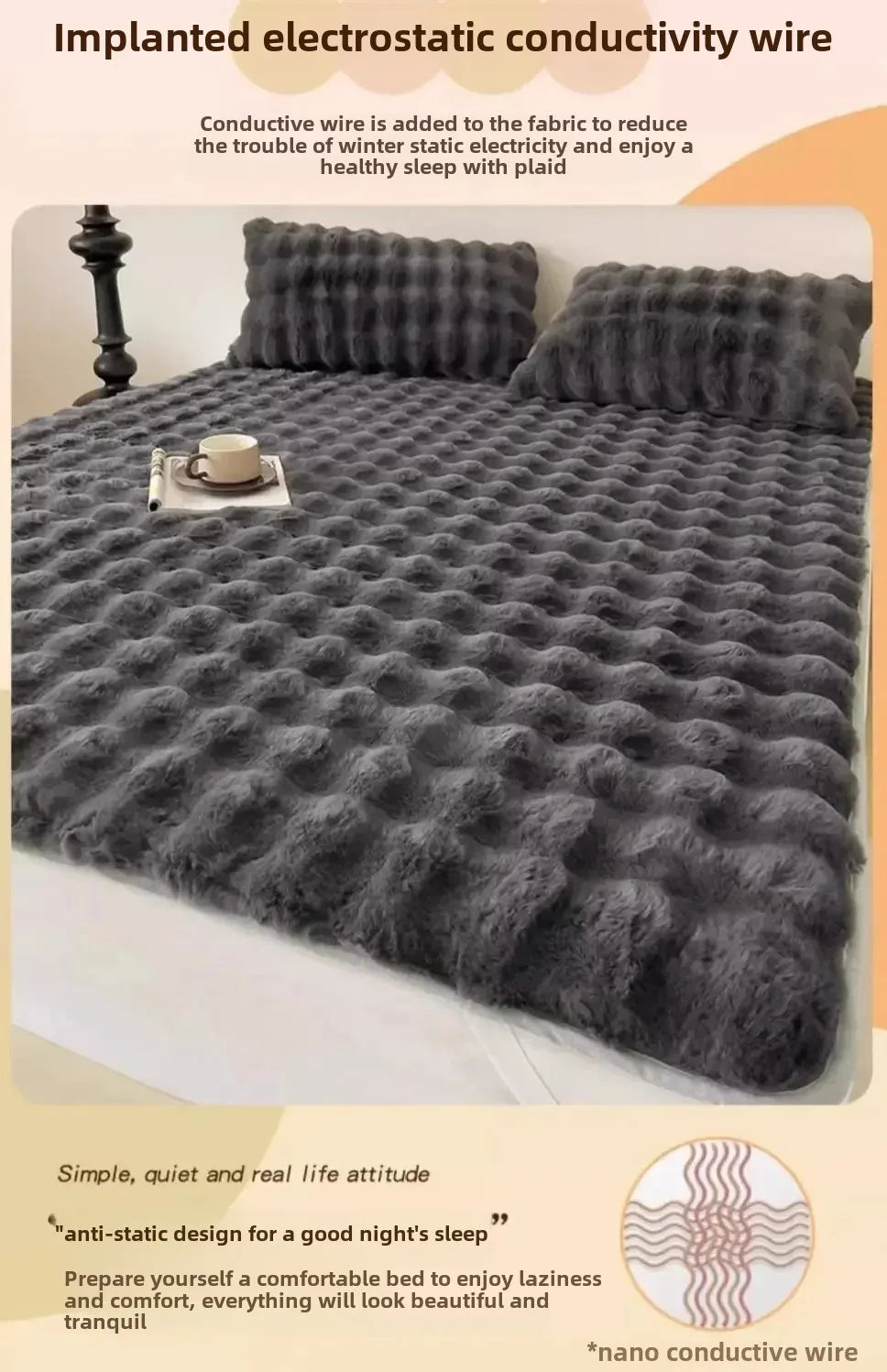 A gray quilted fabric blanket or comforter is shown on a bed, featuring implanted electrostatic conductivity wire.