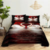 A bedding set featuring a red and black design with white swan motifs.