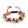A set of braided crystal chip stone bracelets made from natural quartz and amethyst for women.