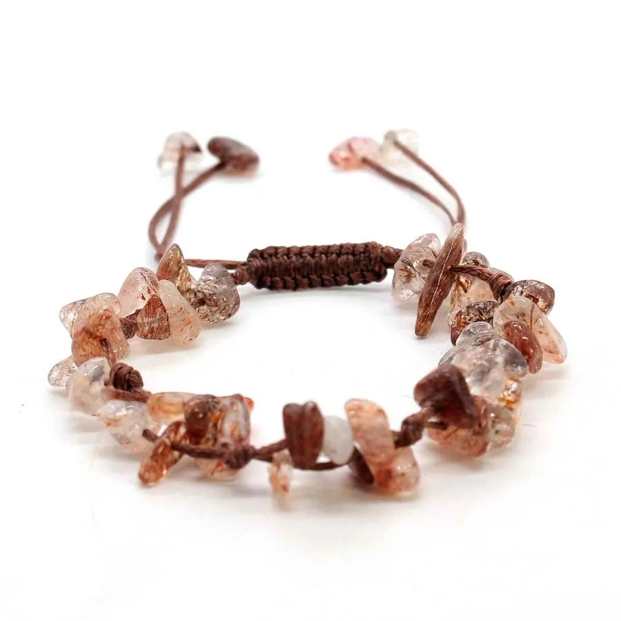 A set of braided crystal chip stone bracelets made from natural quartz and amethyst for women.