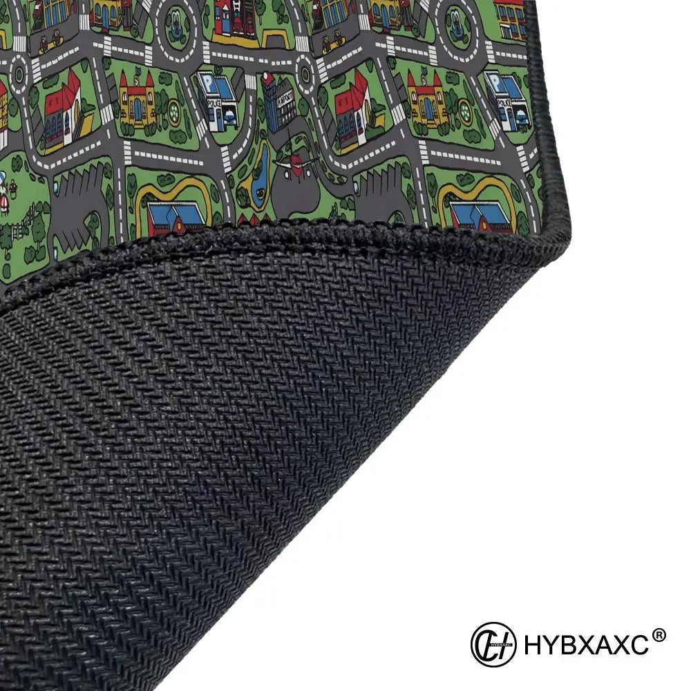 Black gaming mouse pad featuring a vintage city road design with houses and streets.