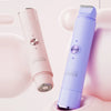 A purple double-headed shaver is shown against a soft pink background.