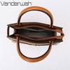 A brown leather handbag with a matching coin purse shown from above.