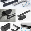 Two adhesive stainless steel toilet paper racks in black and silver finish shown from various angles.