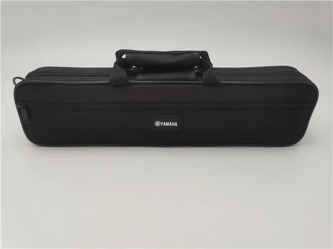 Black Yamaha flute case with a black carrying strap.
