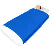A child is sleeping comfortably on a bright blue breathable stretchy sensory bed sheet.