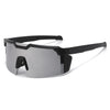 A pair of black sports sunglasses with gray lenses and a black frame are shown against a white background.