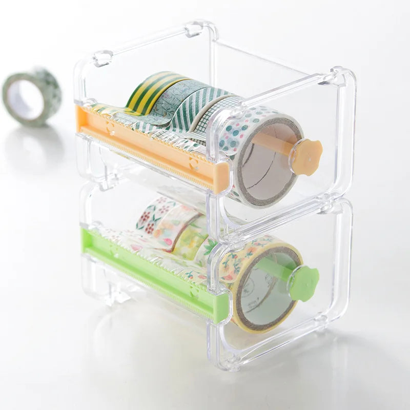 Clear plastic storage box holding various rolls of colorful decorative washi tape.