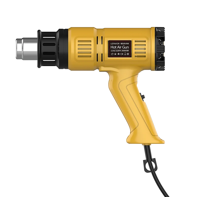 A yellow hot air gun with a silver nozzle and black handle is shown against a black background.