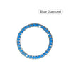 A round blue diamond crystal rhinestone start/stop button cover.