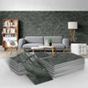 Stacks of dark gray marble self-adhesive wall stickers used as 3D tile decals in a modern room setting.