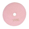 A circular pink polishing pad with a central hole and the number 3000 engraved on it.