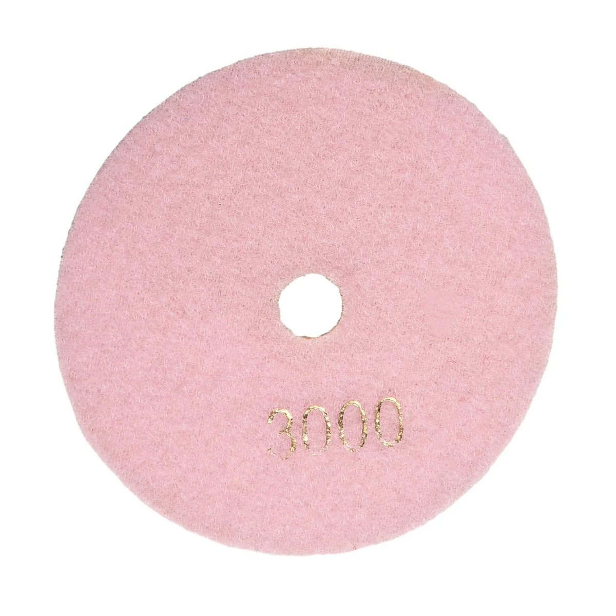 A circular pink polishing pad with a central hole and the number 3000 engraved on it.