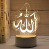 A translucent acrylic LED night light featuring the Arabic calligraphy of Allah and Muhammad on a circular base.
