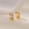Boucles d'oreilles créoles en zircon cubique ton or