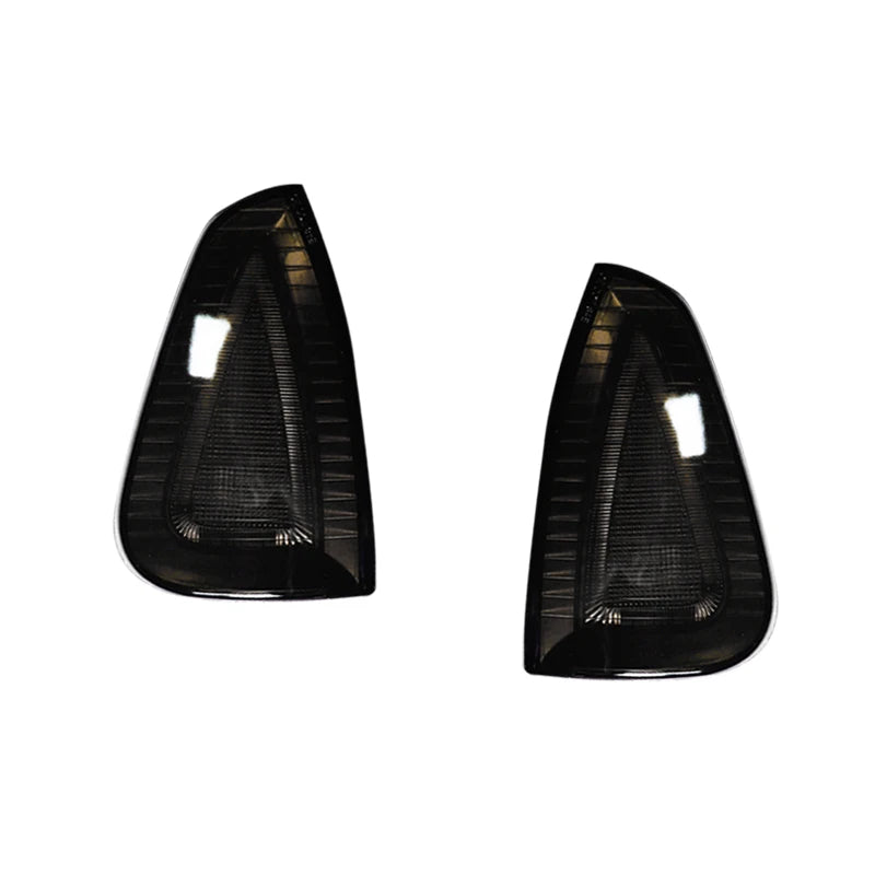 Black plastic front side marker light housings for a Dodge Charger, shown from the front.