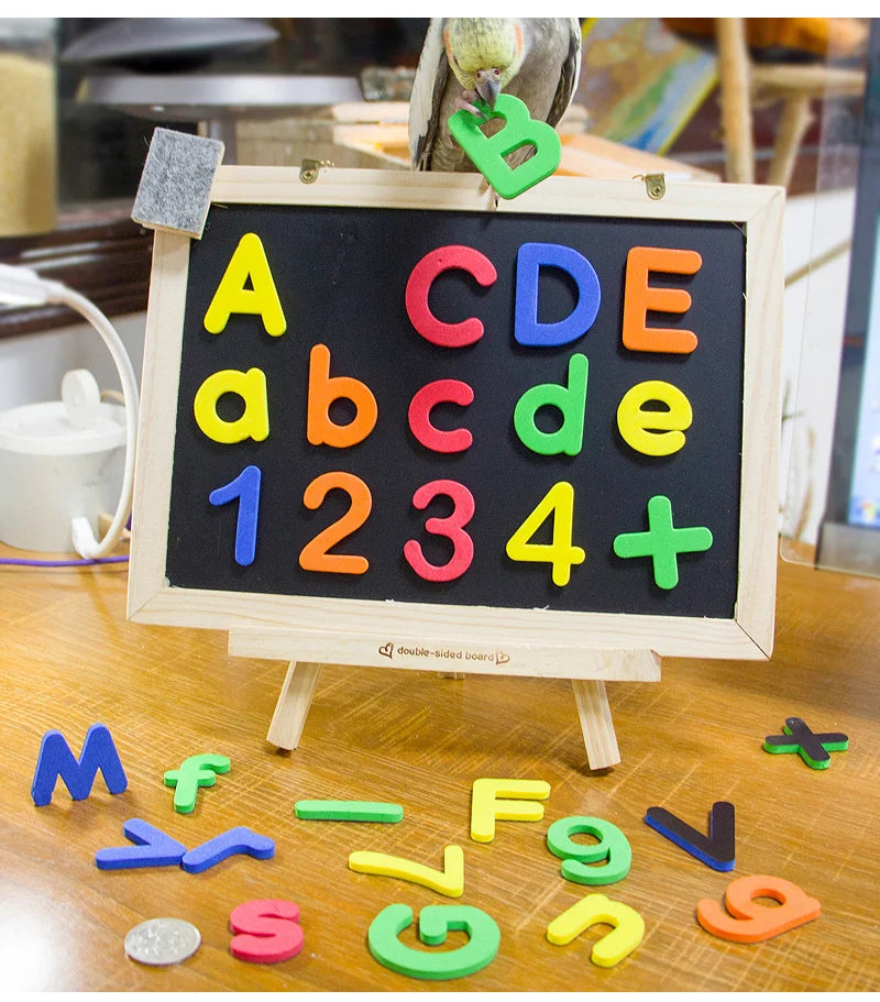 A magnetic alphabet learning set featuring colorful letters and numbers scattered on a wooden surface.