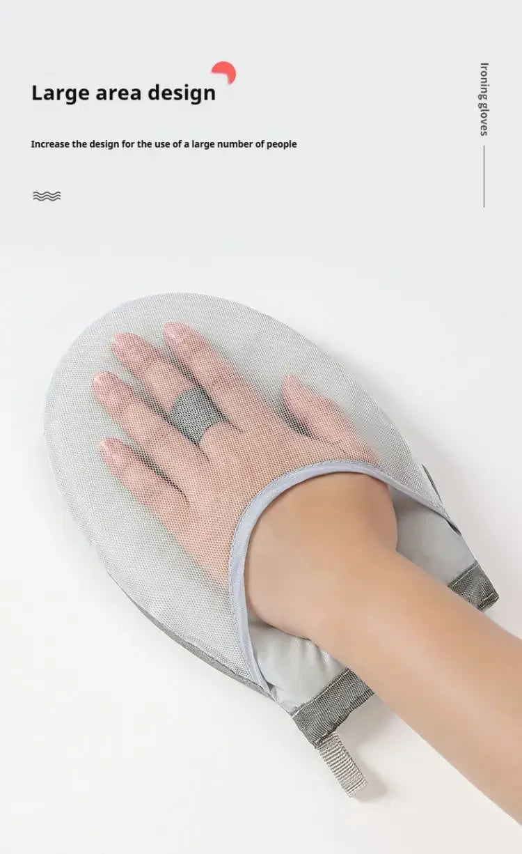 A hand wearing a grey ironing glove is shown resting on a light gray ironing board.