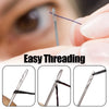 Close-up of a sewing needle being threaded, demonstrating easy threading with a self-threading set.