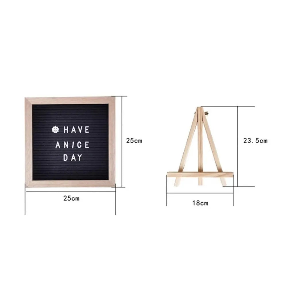 Pizarra de fieltro negra con texto blanco 'HAVE ANICE DAY', montada en un marco de madera natural.