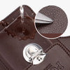 A close-up of a brown PU leather waist bag showing a detail of the stitching and a silver snap button.