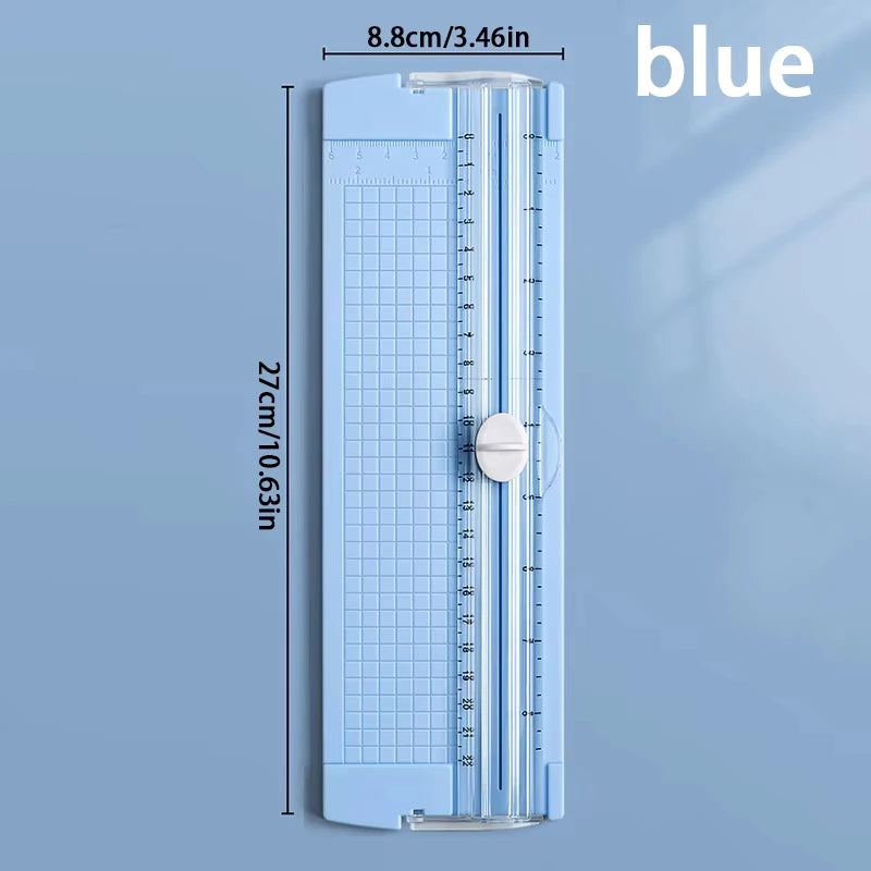 A blue A4 mini paper trimmer with a precision cutter shown vertically against a light blue background.