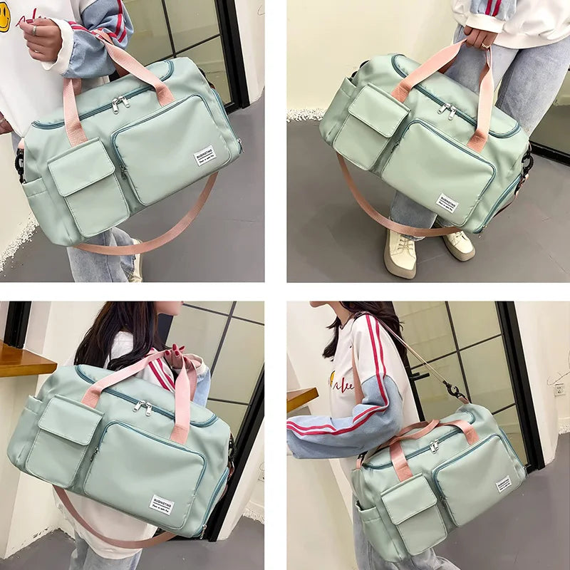 A light mint green waterproof travel duffle bag with a shoe compartment being carried by a person.