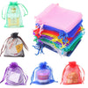 Assorted organza drawstring gift bags in various colors including pink, blue, green, and red for jewelry and small items