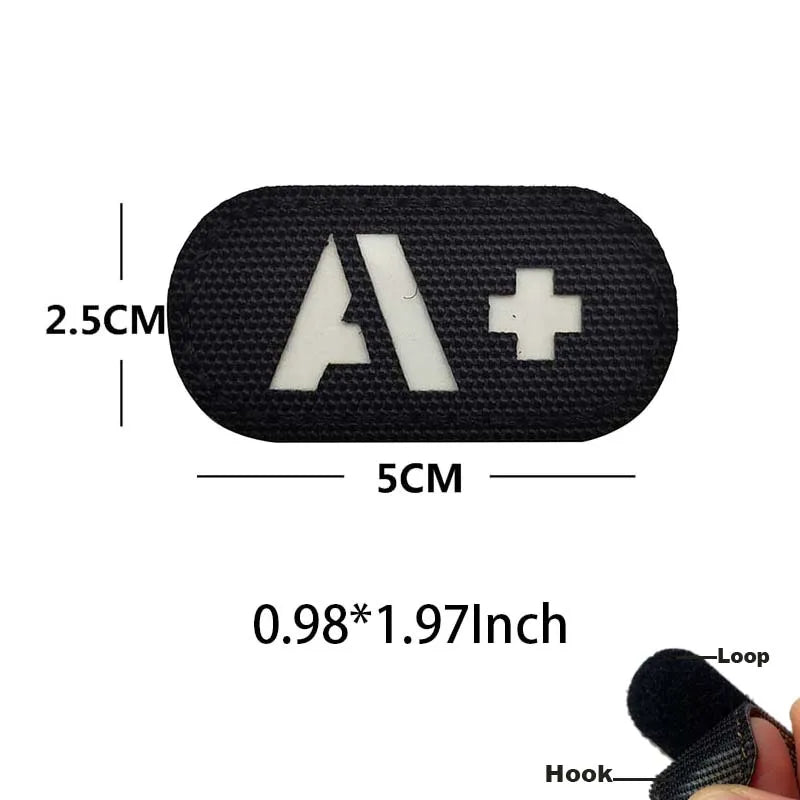 Black glow-in-the-dark blood type tactical patch with hook and loop backing